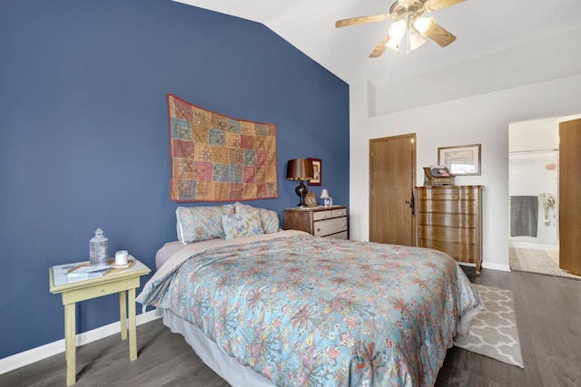 bedroom featuring vaulted ceiling, ceiling fan, wood finished floors, and baseboards