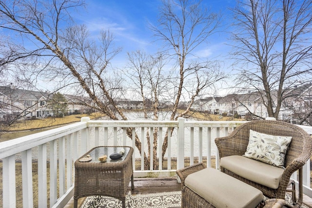 wooden terrace with a residential view