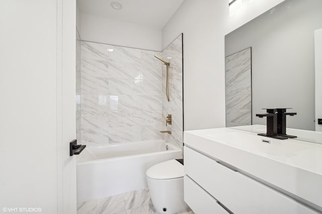 bathroom featuring marble finish floor, shower / bathing tub combination, vanity, and toilet