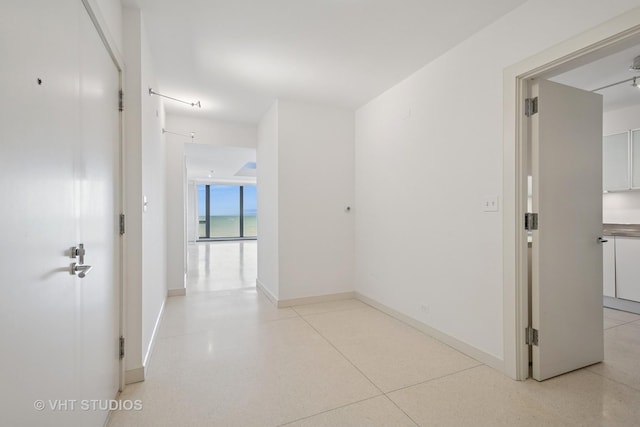 hallway with baseboards