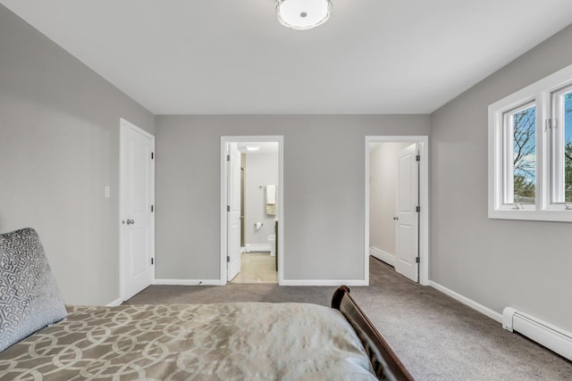 unfurnished bedroom featuring carpet floors, a baseboard radiator, ensuite bathroom, a baseboard heating unit, and baseboards