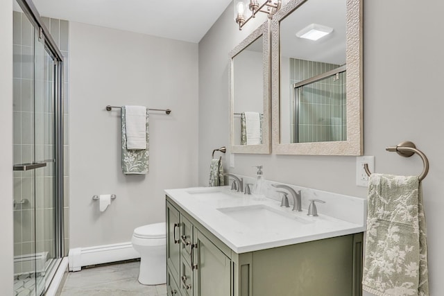 full bath featuring double vanity, a stall shower, baseboard heating, and a sink