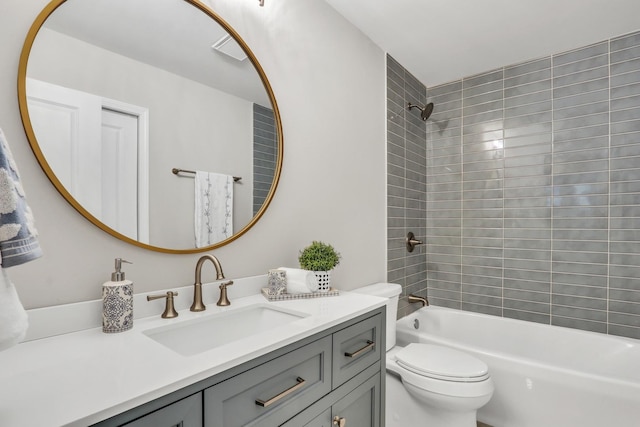 bathroom featuring shower / washtub combination, vanity, and toilet