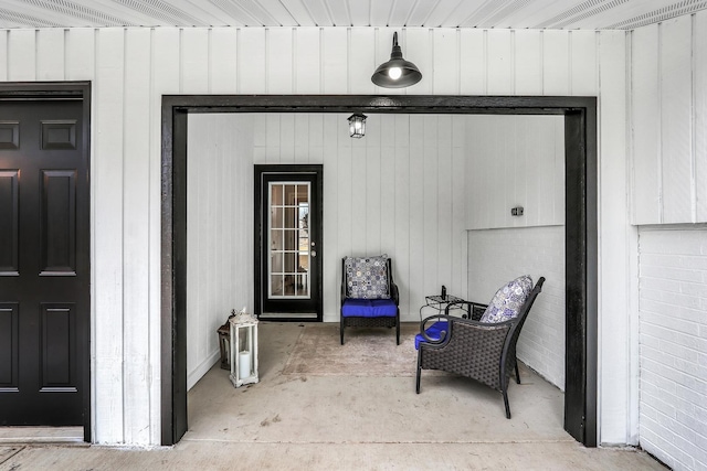 property entrance with board and batten siding