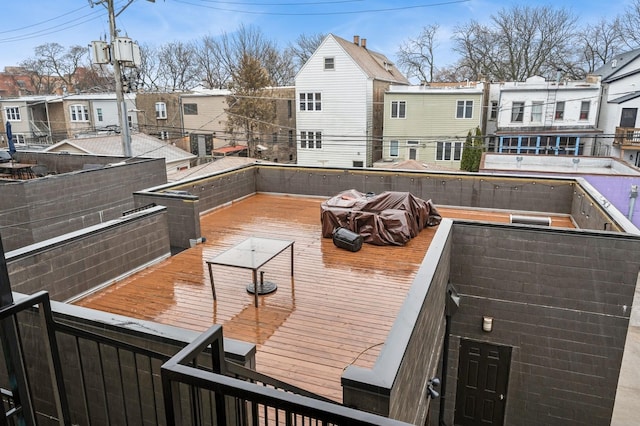 wooden deck with a residential view