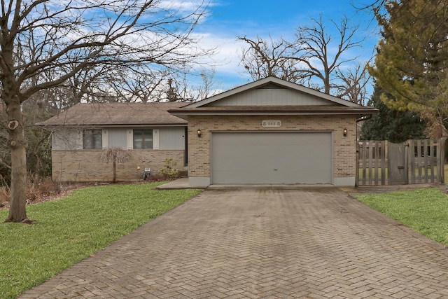 ranch-style home featuring fence, an attached garage, a front lawn, decorative driveway, and brick siding