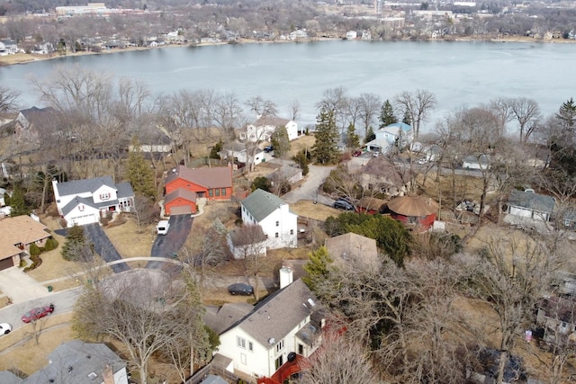 aerial view featuring a residential view and a water view