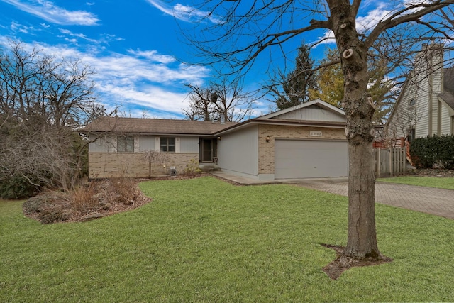 ranch-style home with fence, an attached garage, a front lawn, decorative driveway, and brick siding