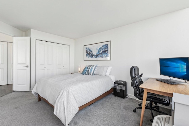 bedroom featuring a closet and carpet flooring