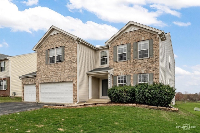 2355 Avalon Ct, Aurora, IL 60503 - traditional-style house with a garage, driveway, a front yard, and brick siding