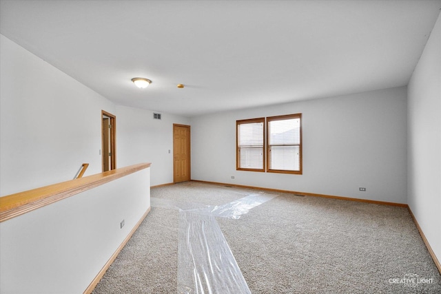 2355 Avalon Ct, Aurora, IL 60503 - spare room featuring light colored carpet and baseboards