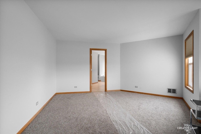 2355 Avalon Ct, Aurora, IL 60503 - carpeted empty room with baseboards