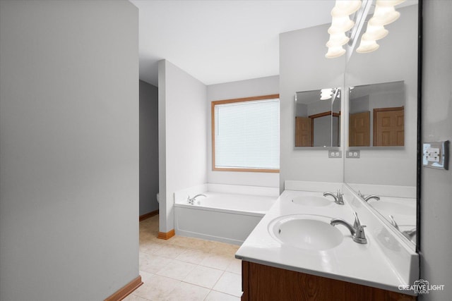 2355 Avalon Ct, Aurora, IL 60503 - bathroom with double vanity, a bath, tile patterned floors, baseboards, and a chandelier