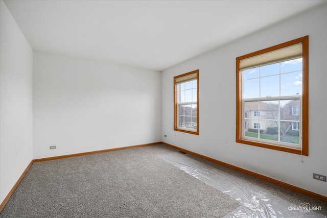 2355 Avalon Ct, Aurora, IL 60503 - empty room with light colored carpet and baseboards