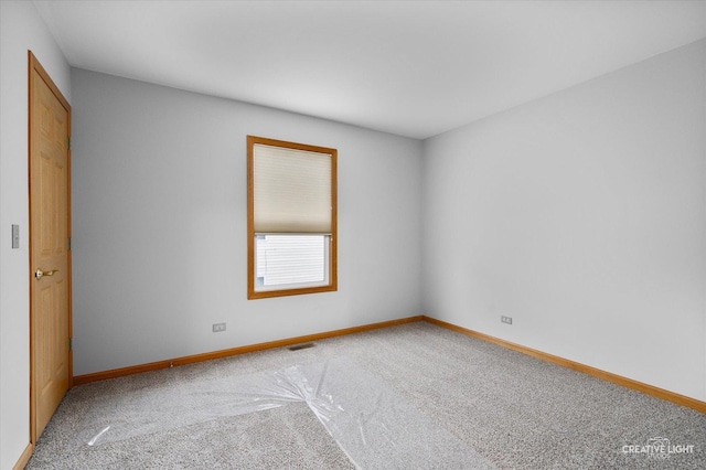 2355 Avalon Ct, Aurora, IL 60503 - carpeted spare room featuring baseboards