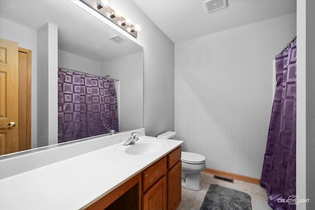 2355 Avalon Ct, Aurora, IL 60503 - full bath featuring vanity, toilet, tile patterned floors, baseboards, and a shower with curtain
