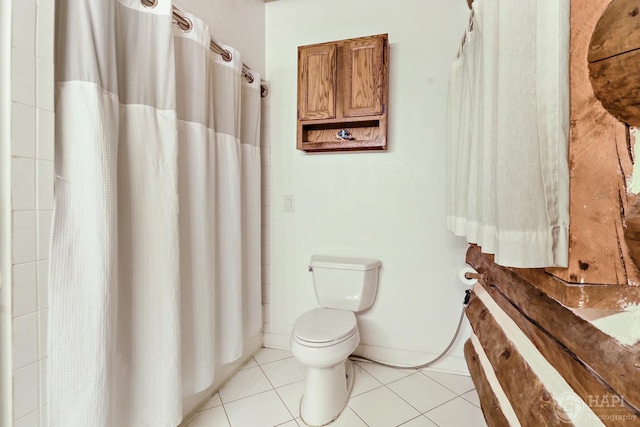 39575 N Dilleys Rd, Wadsworth, IL 60083 - full bath with tile patterned floors, curtained shower, baseboards, and toilet