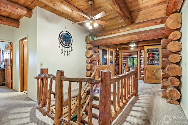 39575 N Dilleys Rd, Wadsworth, IL 60083 - hallway with beamed ceiling, an upstairs landing, wooden ceiling, and rustic walls