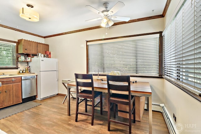 39575 N Dilleys Rd, Wadsworth, IL 60083 - dining space featuring light wood-style flooring, a ceiling fan, ornamental molding, baseboard heating, and baseboards