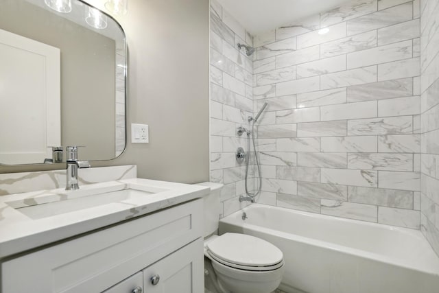 full bath with vanity, toilet, and bathing tub / shower combination