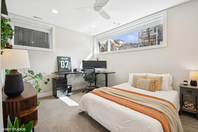 carpeted bedroom featuring recessed lighting, baseboards, visible vents, and ceiling fan