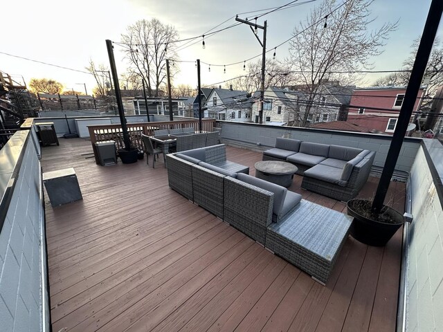 deck featuring a residential view and outdoor lounge area