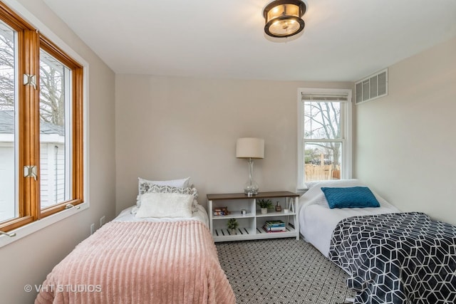 bedroom with visible vents