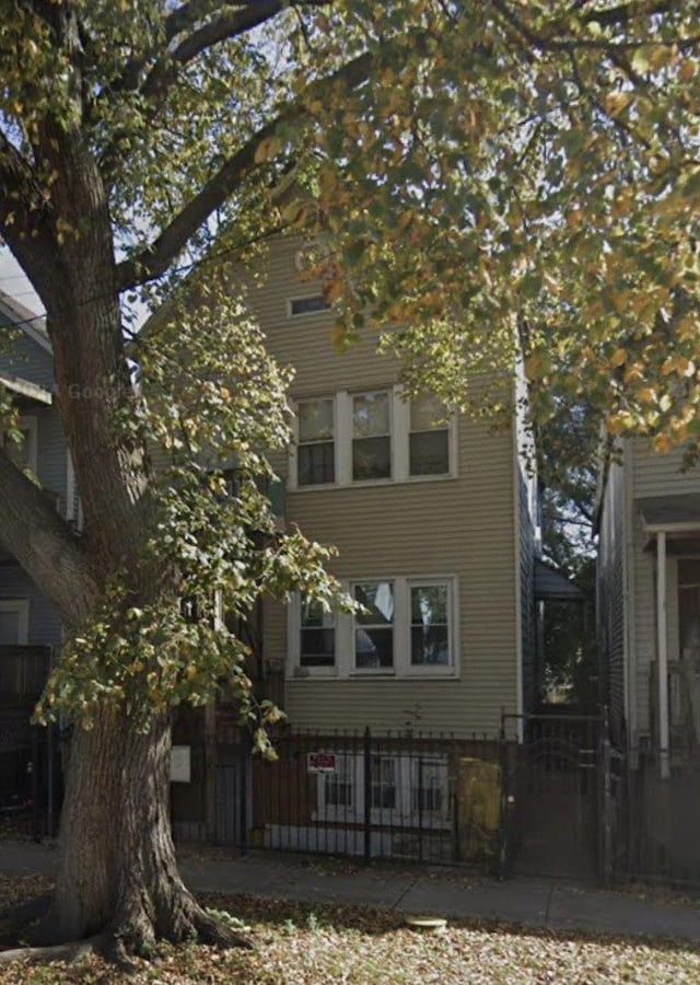 exterior space with a fenced front yard