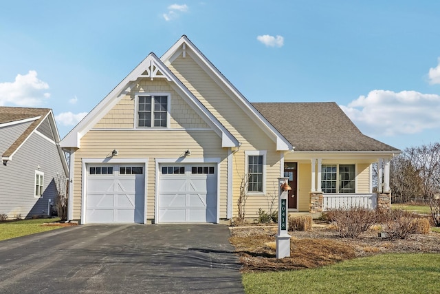 view of front of home with aphalt driveway, a porch, and roof with shingles