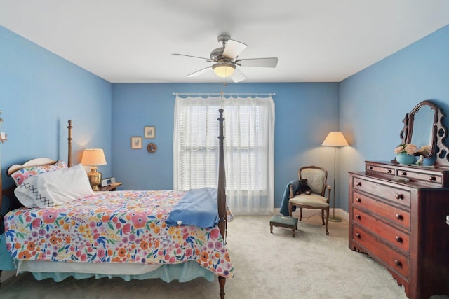 carpeted bedroom featuring a ceiling fan