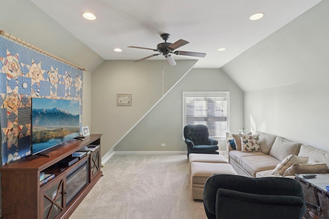 living area featuring vaulted ceiling, light colored carpet, baseboards, and ceiling fan