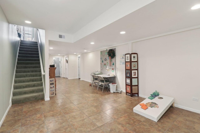 interior space featuring recessed lighting, visible vents, baseboards, and stairs