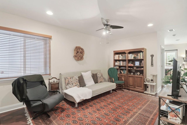 living room with visible vents, recessed lighting, baseboards, and a ceiling fan