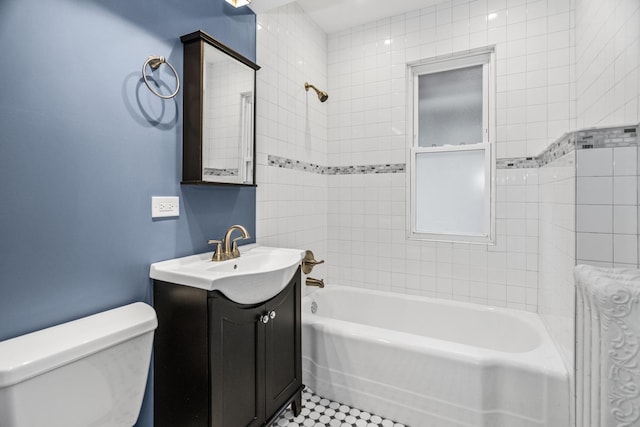 full bathroom featuring  shower combination, toilet, and vanity