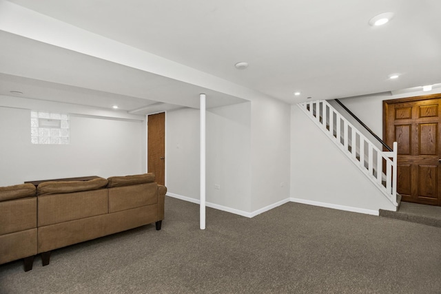 living area featuring recessed lighting, stairway, and baseboards