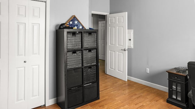 interior space with light wood-style flooring and baseboards