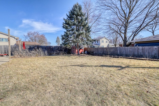 view of yard with a fenced backyard