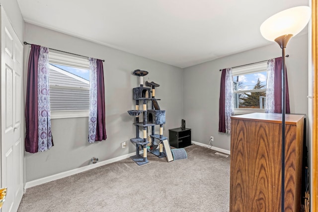 game room featuring carpet floors and baseboards