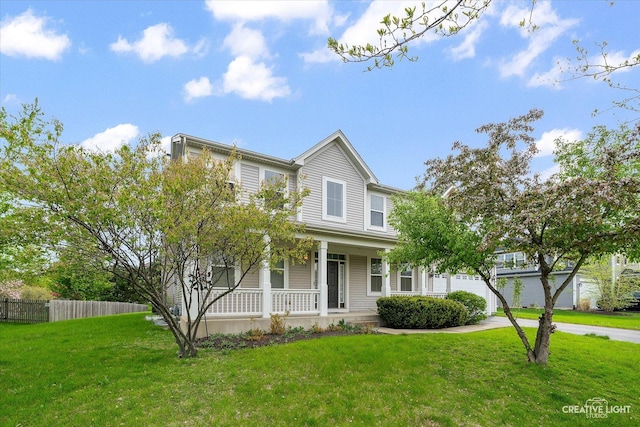 117 Preakness Dr, Oswego, IL 60543 - view of front of property featuring a garage, a front lawn, fence, a porch, and driveway