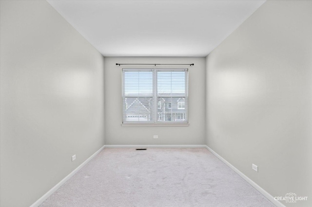 117 Preakness Dr, Oswego, IL 60543 - spare room with baseboards, carpet, and visible vents