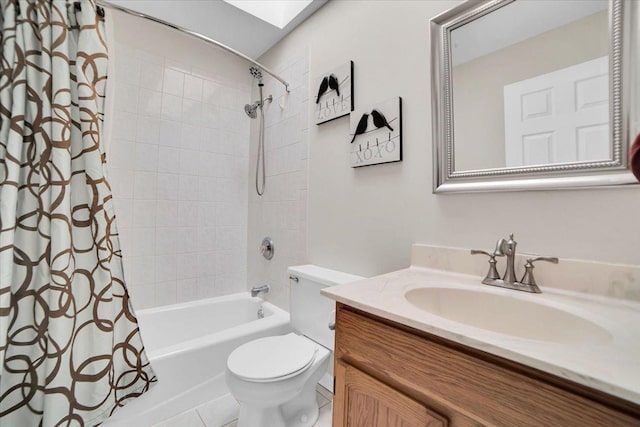 full bathroom with toilet, a skylight, shower / bath combo with shower curtain, and vanity