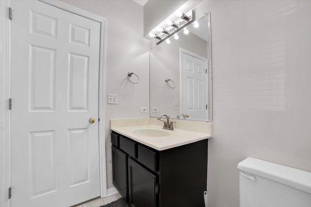 half bath with toilet and vanity