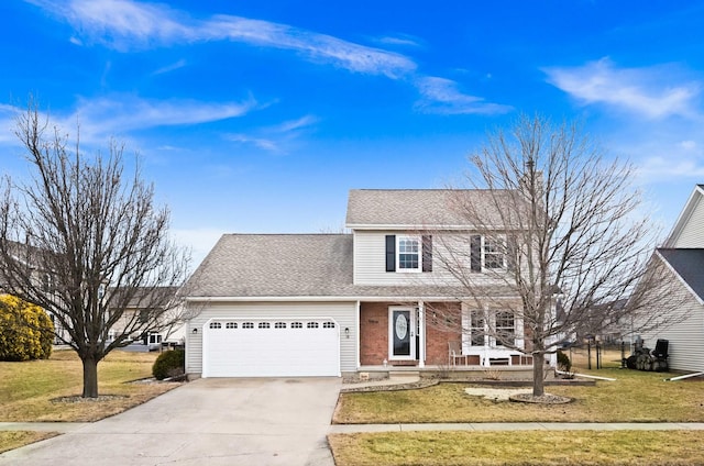 traditional-style house with driveway, a shingled roof, an attached garage, a front yard, and brick siding