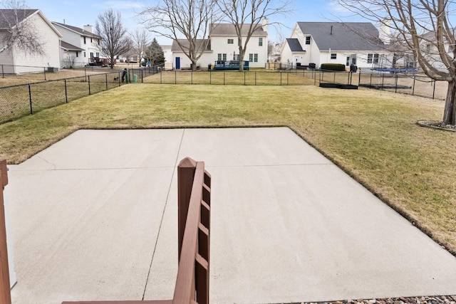 view of patio with fence and a residential view