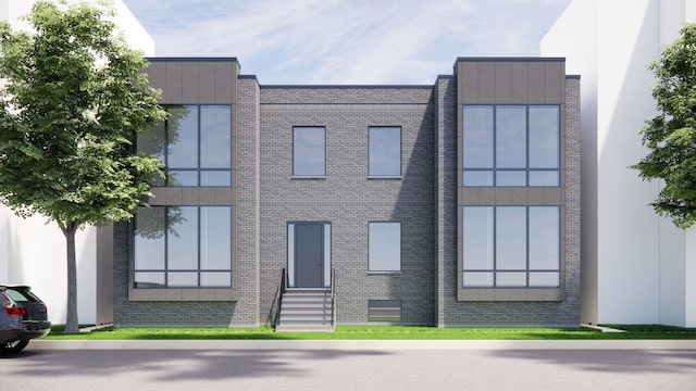 view of front of property with entry steps and brick siding