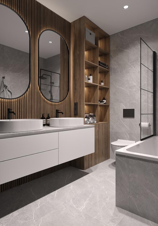 full bathroom with marble finish floor, toilet, a washtub, tile walls, and recessed lighting