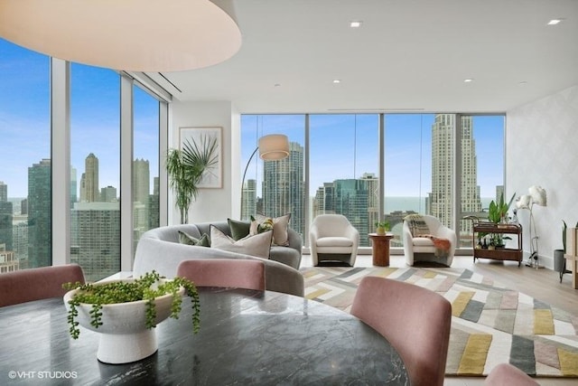 sunroom featuring a view of city and a wealth of natural light