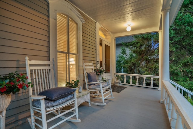 balcony featuring a porch