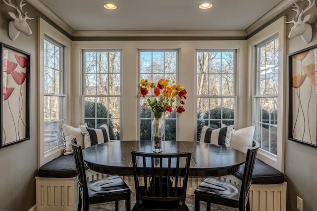 dining room featuring crown molding and recessed lighting