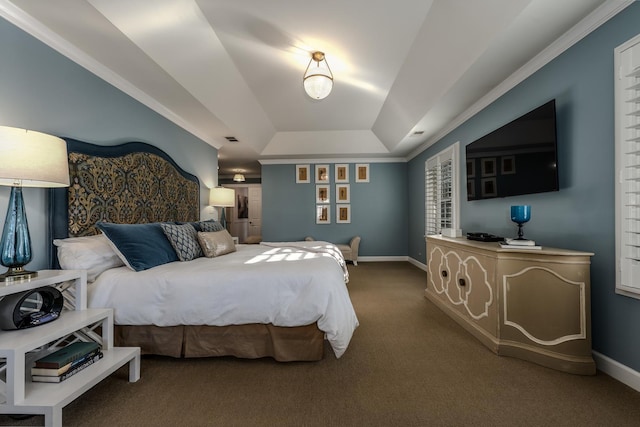 carpeted bedroom with a raised ceiling, visible vents, and baseboards